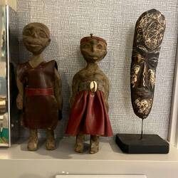 His and hers voodoo dolls from Togo and a mask from Côte D'Ivoire
