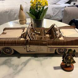 A wee plant, an Archer god and the model car Brad built
