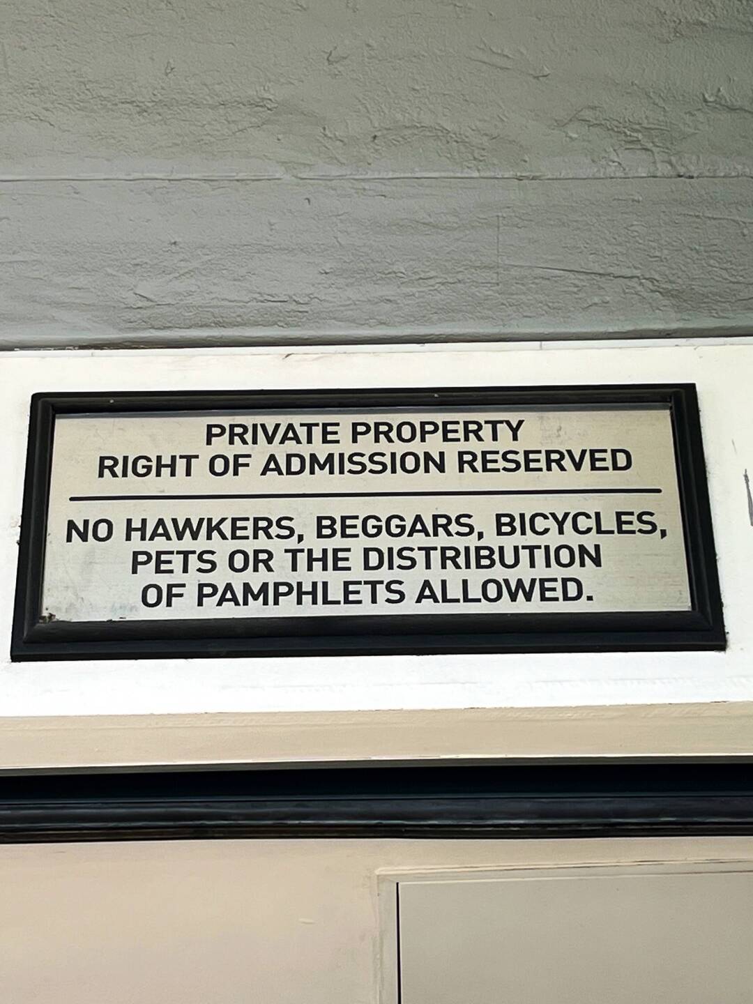 Sign as you enter the mall