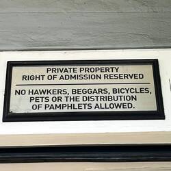Sign as you enter the mall