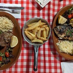 Lamb Kleftiko (left) and Grilled Sea Bream (right)
