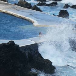Waves crashing into the natural sea pools