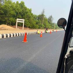 Painting the sriping on the side of the highway!