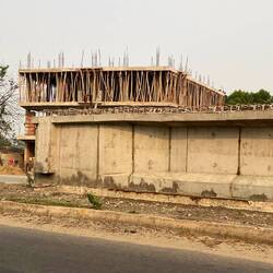 We see this kind of bamboo scafolding/holding up of floors/ceilings all over.