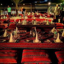 Seating low-to-the-ground — Al Maha Luxury Resort Bedouin Camp — Dubai, UAE.