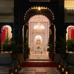 The entry to the hotel, with a beautiful shrine.