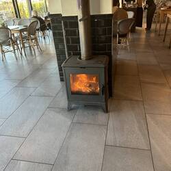 A fire in the breakfast room to dispel the morning dampness