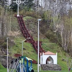 You got to be pretty pious to climb those stairs, never mind needing good knees