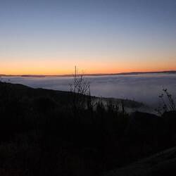 Sun rise from the rock I slept on. My sleeping bag soaked from the dew