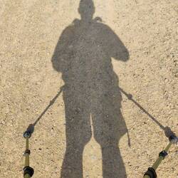 Walking East to West, my shadow is always with me.