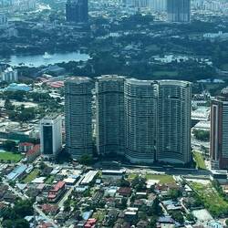 Older original housing right next to new skyscrapers