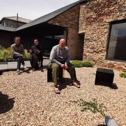 Relaxing outside in the monk's quarters after lunch