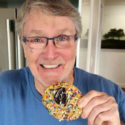 Cook(ie) eating a cookie with a cookie on top 🍪