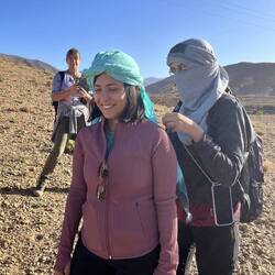 Tying a head scarf the berber way, me taking a video back there
