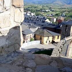 Up ancient stone stairs to top of castle