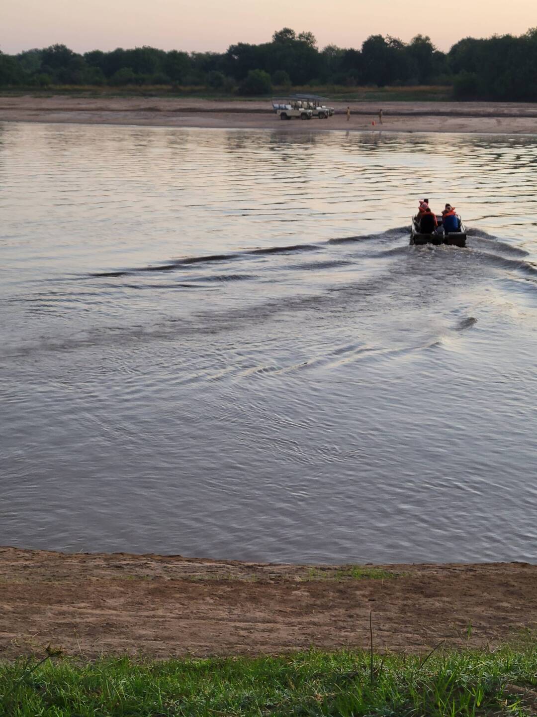 Boat ride across Luangwa River to the park
