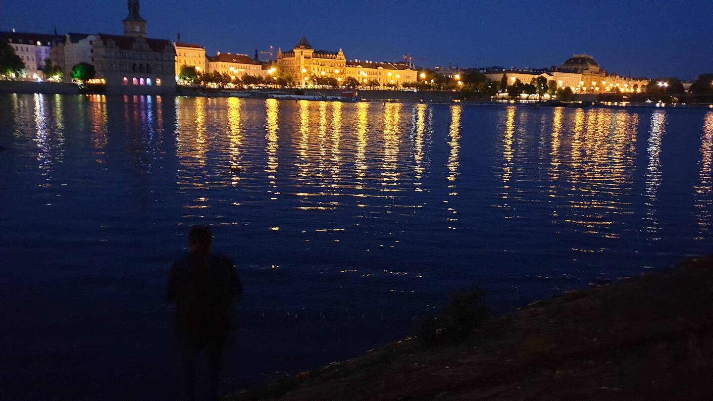 Enjoyed a beer next to the river, watching the city lights