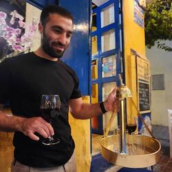 Our waiter, delivering wine in a traditional Turkish tray