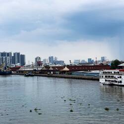 Sailing down Saigon River, Vietnam.