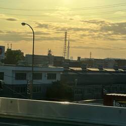 En route from NRT to HND, with silhouette of Tokyo Skytree in the distance.
