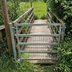Walked across dozens of these bridges across 'reen' drainage channels. Excellent gates at each end.