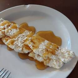 Local soft cheese with candied chestnuts drizzled with honey