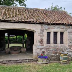 Historic village building commemorating farming heritage