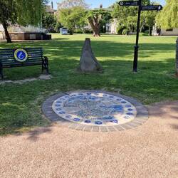 Plaque and scultures marking the end of Wales Coast path