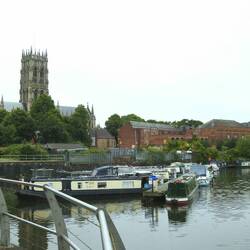 Rainboat hiding at the visitor moorings with Doncaster Minster in the background
