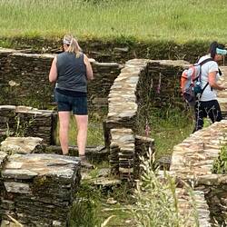 Deanne and Veronica taking a closer look at the ruins.