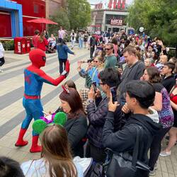 Ava about to high five Spiderman
