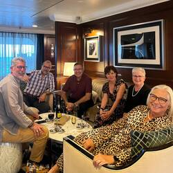 Happy group at happy hour — Aboard Insignia.