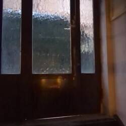 Walking out of the building. Very obscure place!