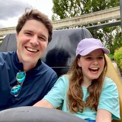 Joy enjoying driving dad almost too much!