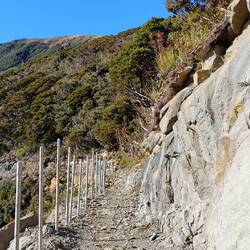 Amazing track cut from rocky cliff