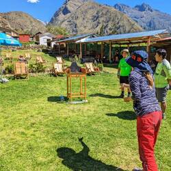 Playing Sapo (you try to throw golden coins into the frog's mouth)
