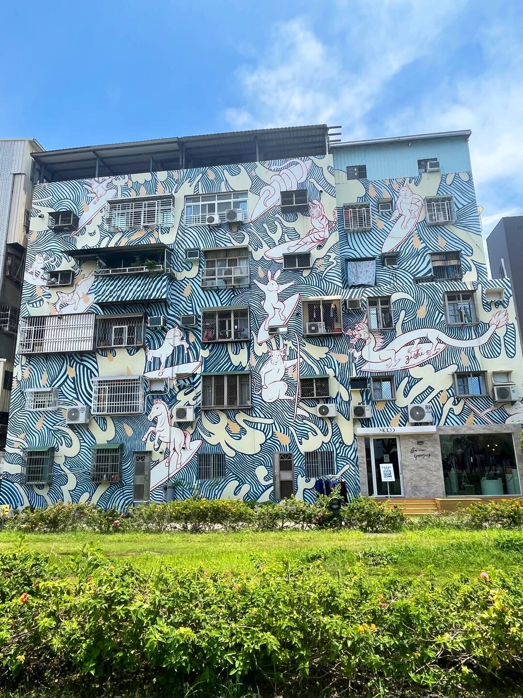 Many of the buildings in the area have murals