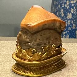 A rock carved to look like pork belly