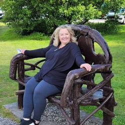 Dena in a big chair