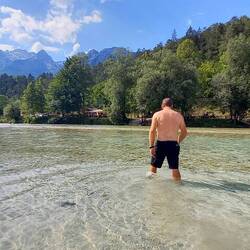 We were able to cool our burning feet in the river with a local dog watching over.