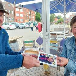 Der eingelöst Gutschein für ein Backfischbrötchen und ein Bier bei Fiete