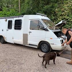 My car park mates Lee and Happy and the 80's van they live in. Extinction rebellion and a' that