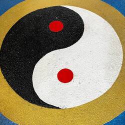 Yin Yang on the floor - opposite but interconnected