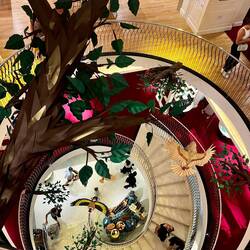 A view of all four floors of Fortnum and Mason down the spiral staircase