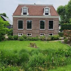 Example of a brick farmhouse; large windows are common too.