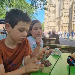 Eating icecream outside York Minster...a bribe to convince the kids to go in an check out the church