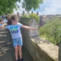 Belle defending York with her expert archery skills... thanks to Pa