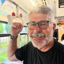 Note the strap Brad's holding on the train