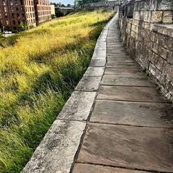 Walking the city walls that were used to protect the city in the 1400s