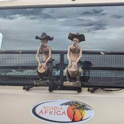 The mascots sitting on the front of our new tour truck